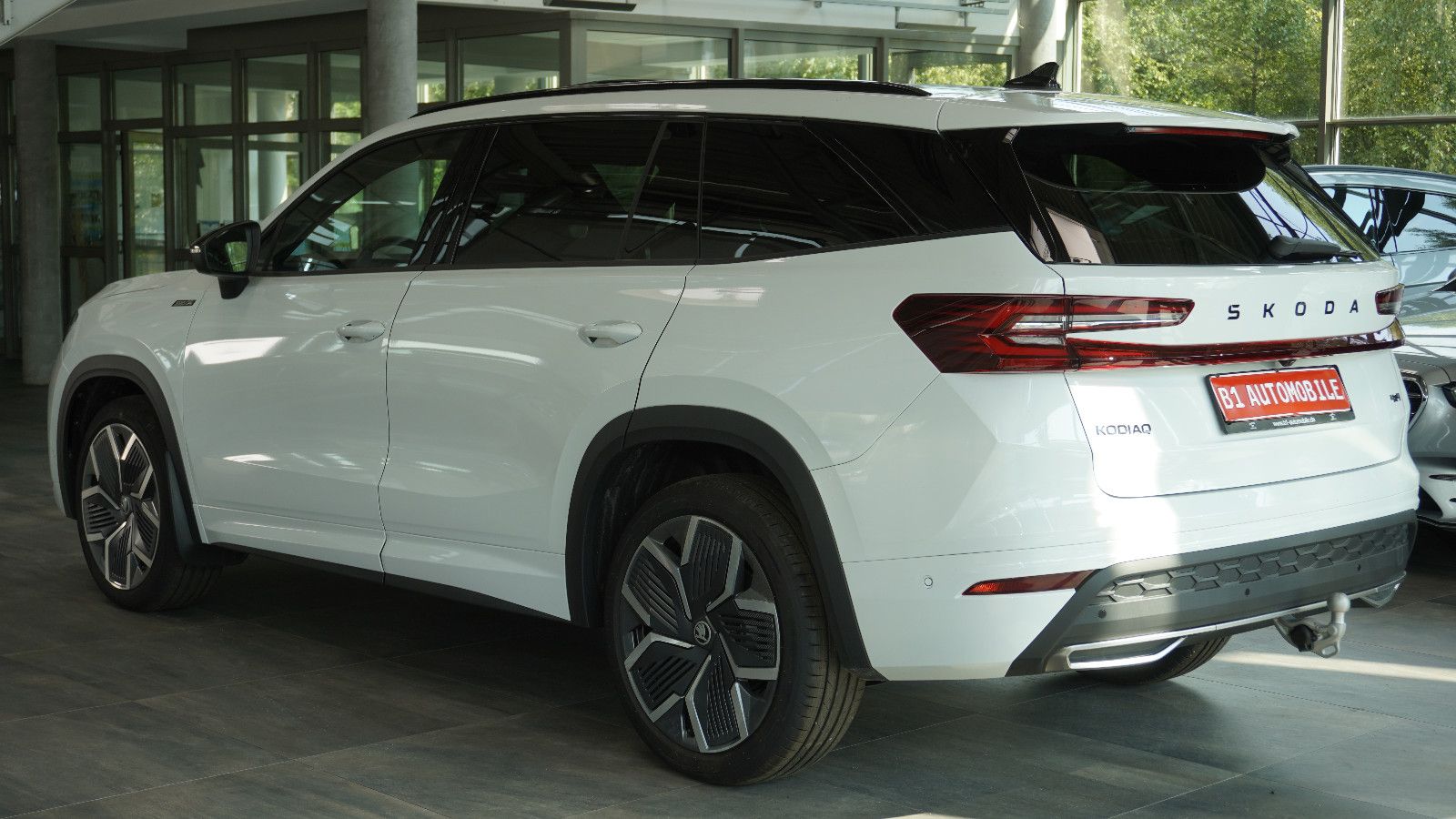 Skoda Kodiaq 2.0 TDI 4x4 Sportline*AHK*HEAD-UP*PANO*7S