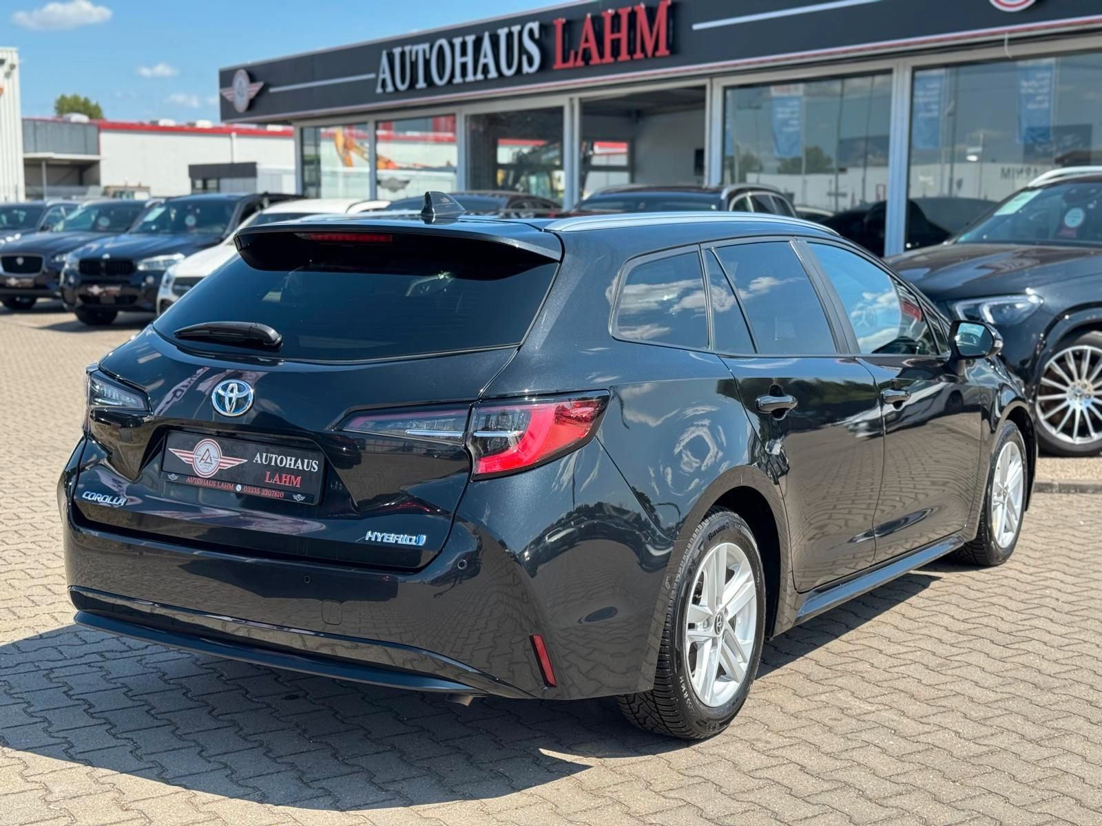 Toyota Corolla Touring Sports Hybrid Business Edition - Samsaru's Car Outlet