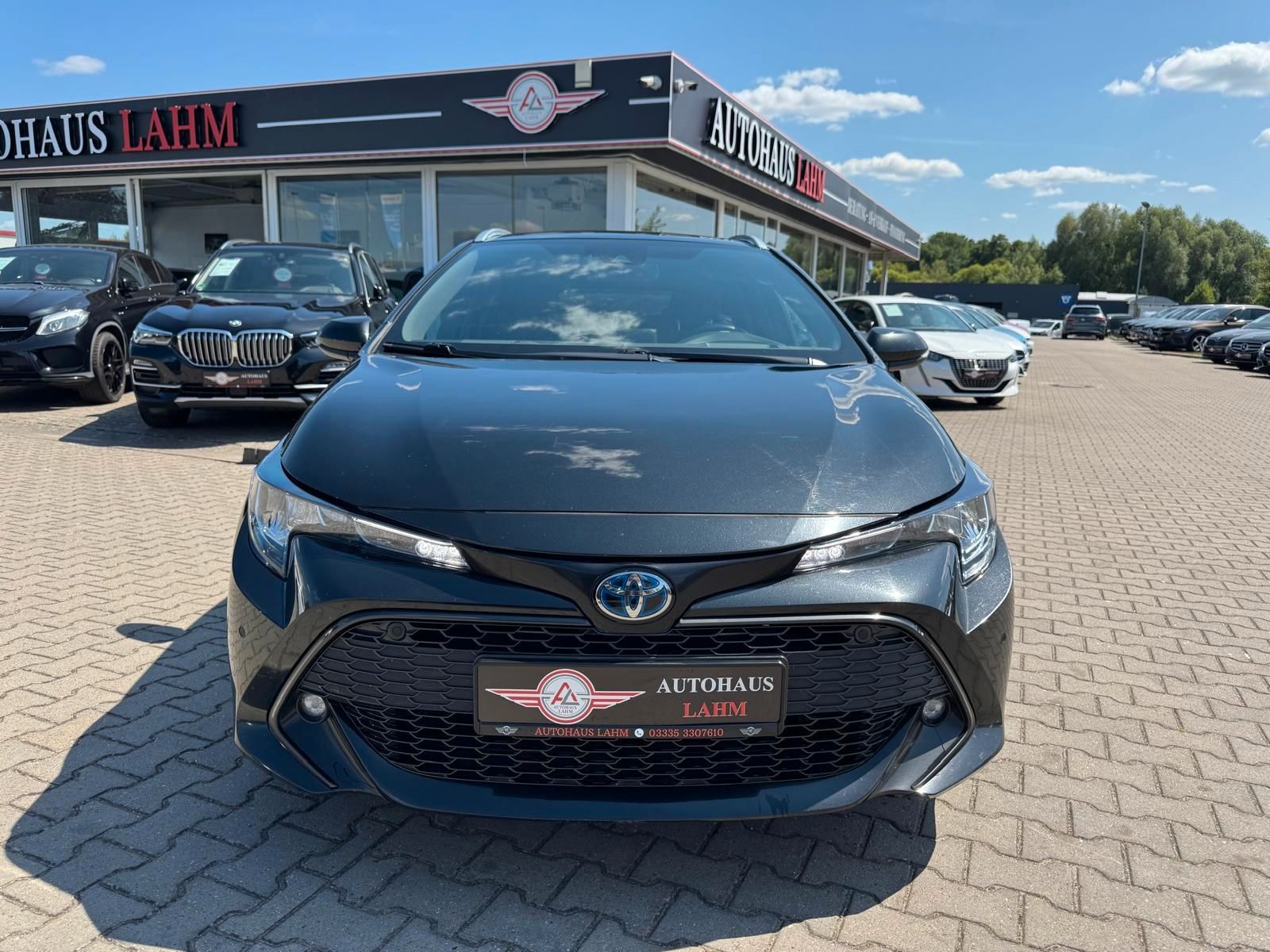 Toyota Corolla Touring Sports Hybrid Business Edition - Samsaru's Car Outlet