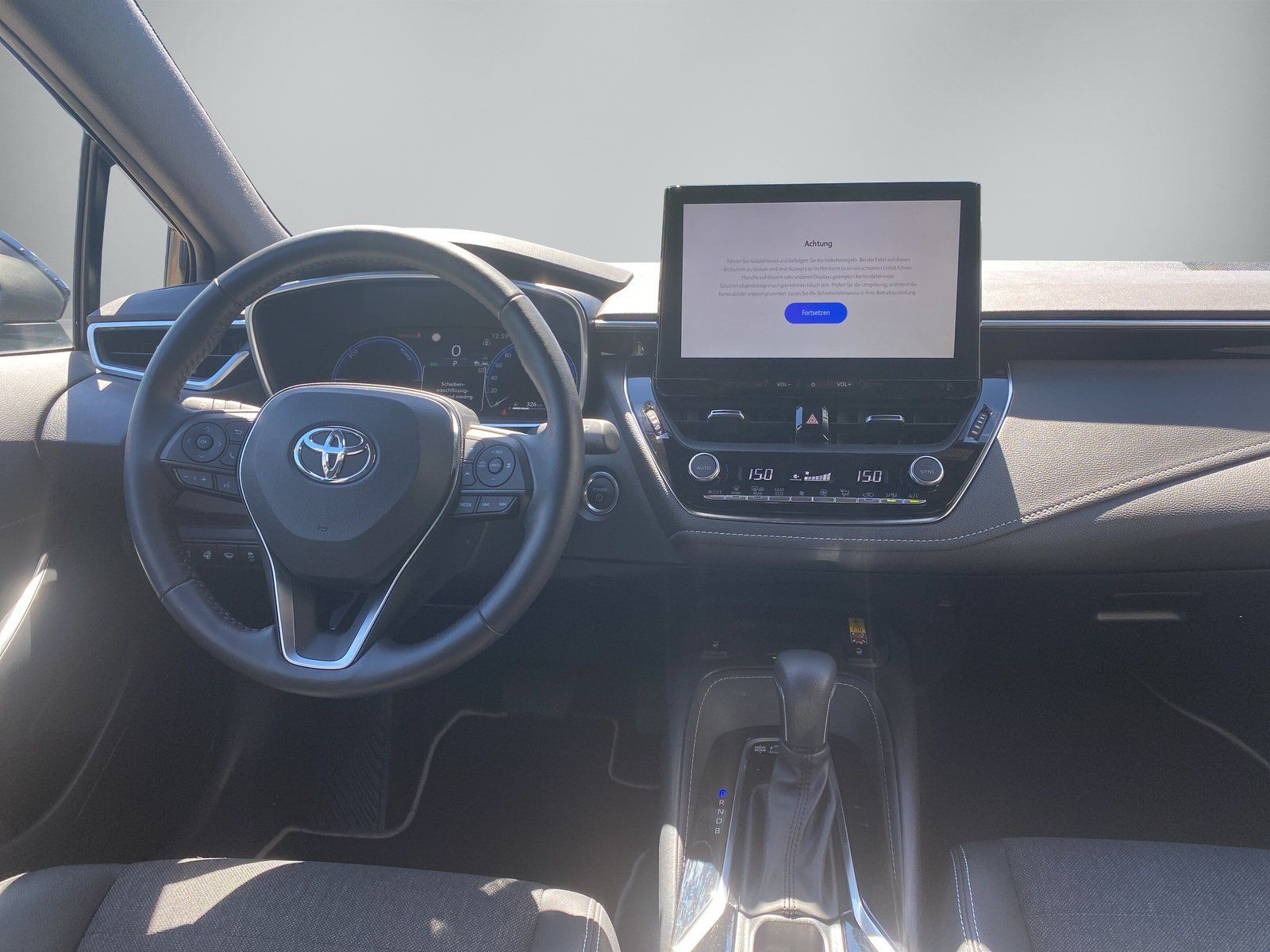 Toyota Corolla 1,8 Hybrid Touring Sports Teamplayer mit