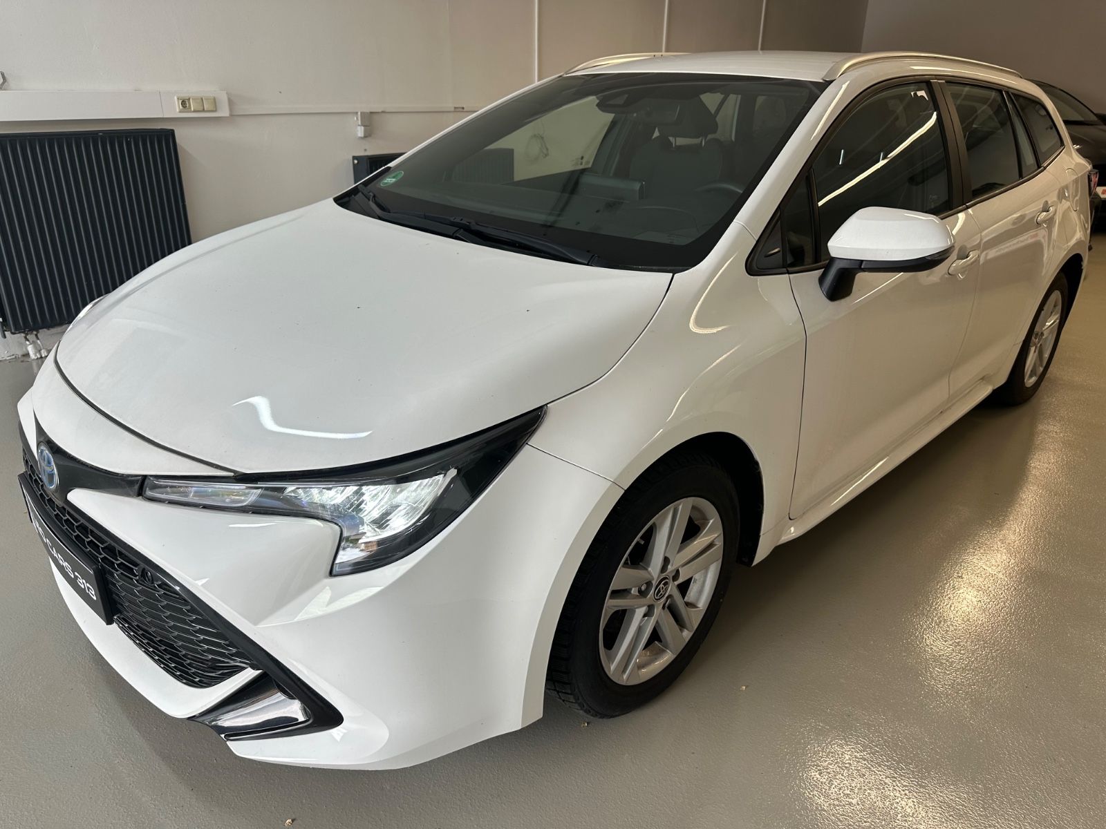 Toyota Corolla Touring Sports Hybrid Business Edition - Samsaru's Car Outlet