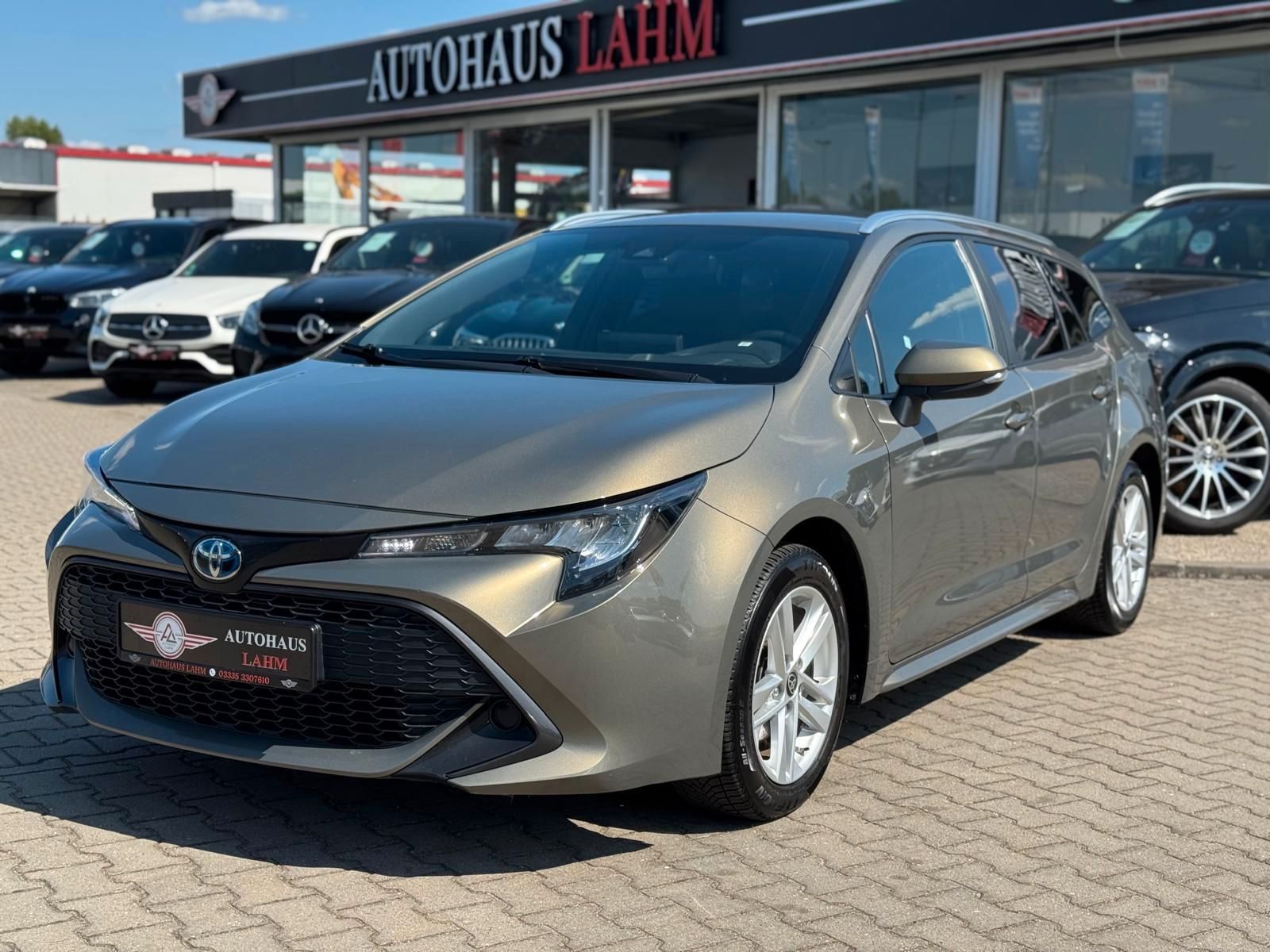 Toyota Corolla Touring Sports Hybrid Business Edition - Samsaru's Car Outlet