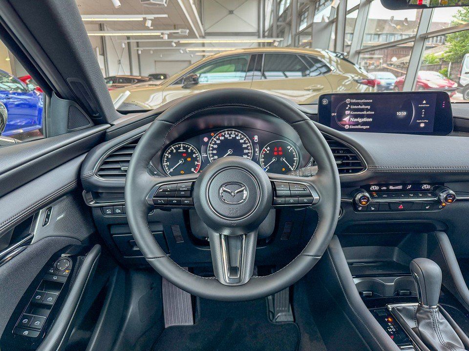 Mazda 3 Exclusive-Line