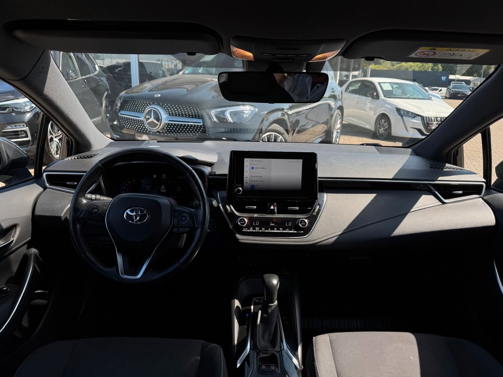 Toyota Corolla Touring Sports Hybrid Business Edition - Samsaru's Car Outlet