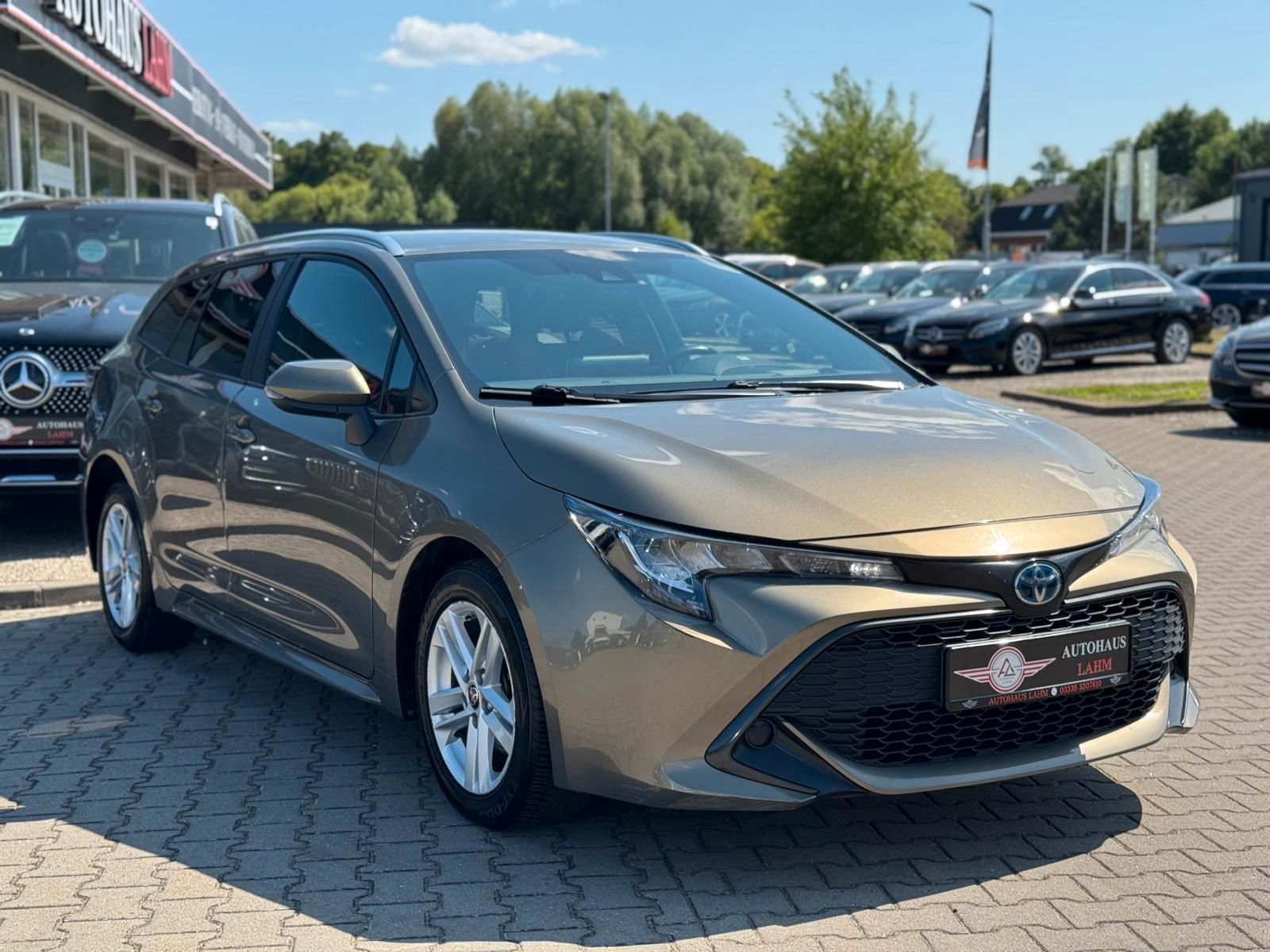 Toyota Corolla Touring Sports Hybrid Business Edition - Samsaru's Car Outlet