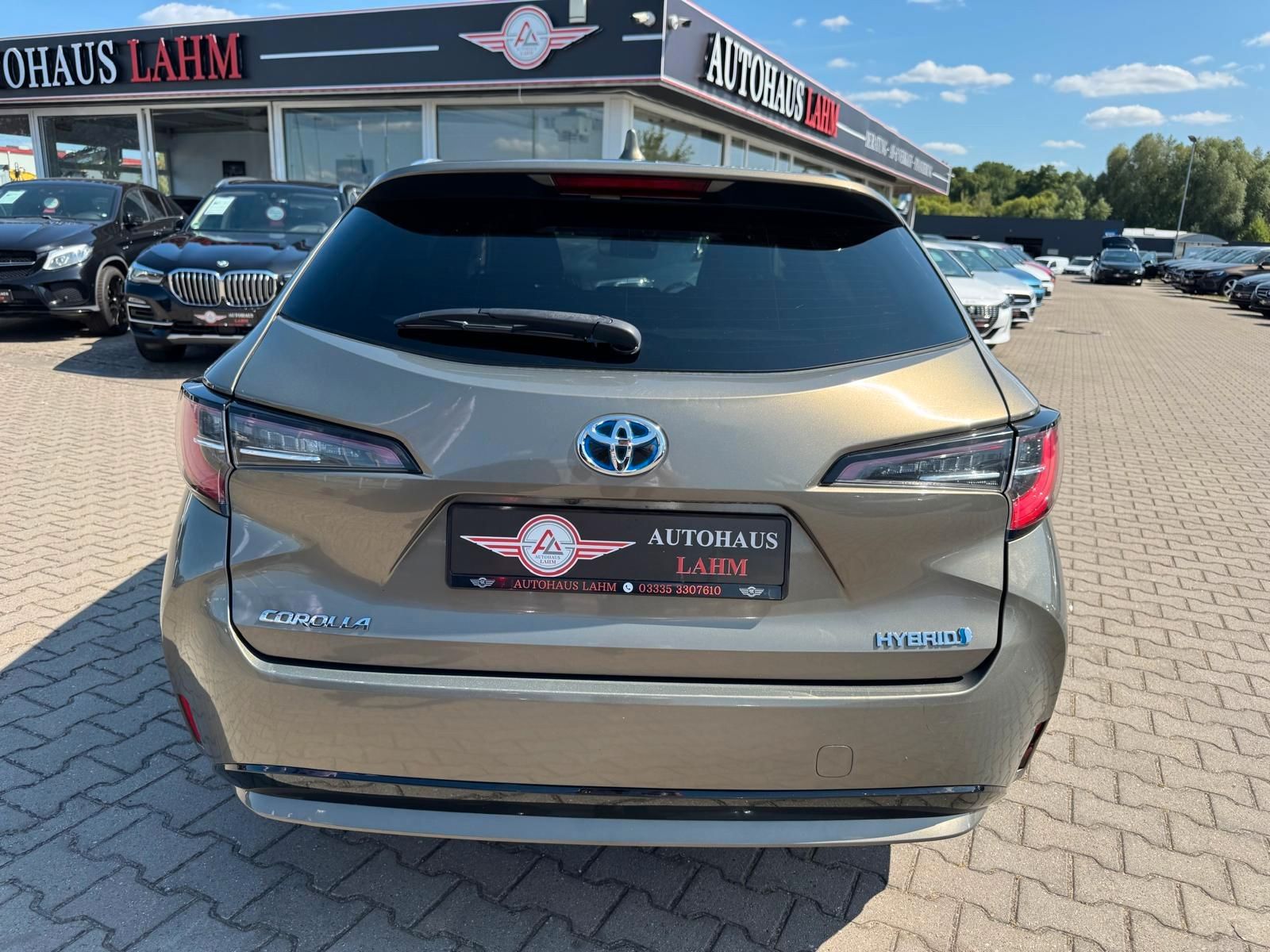 Toyota Corolla Touring Sports Hybrid Business Edition - Samsaru's Car Outlet