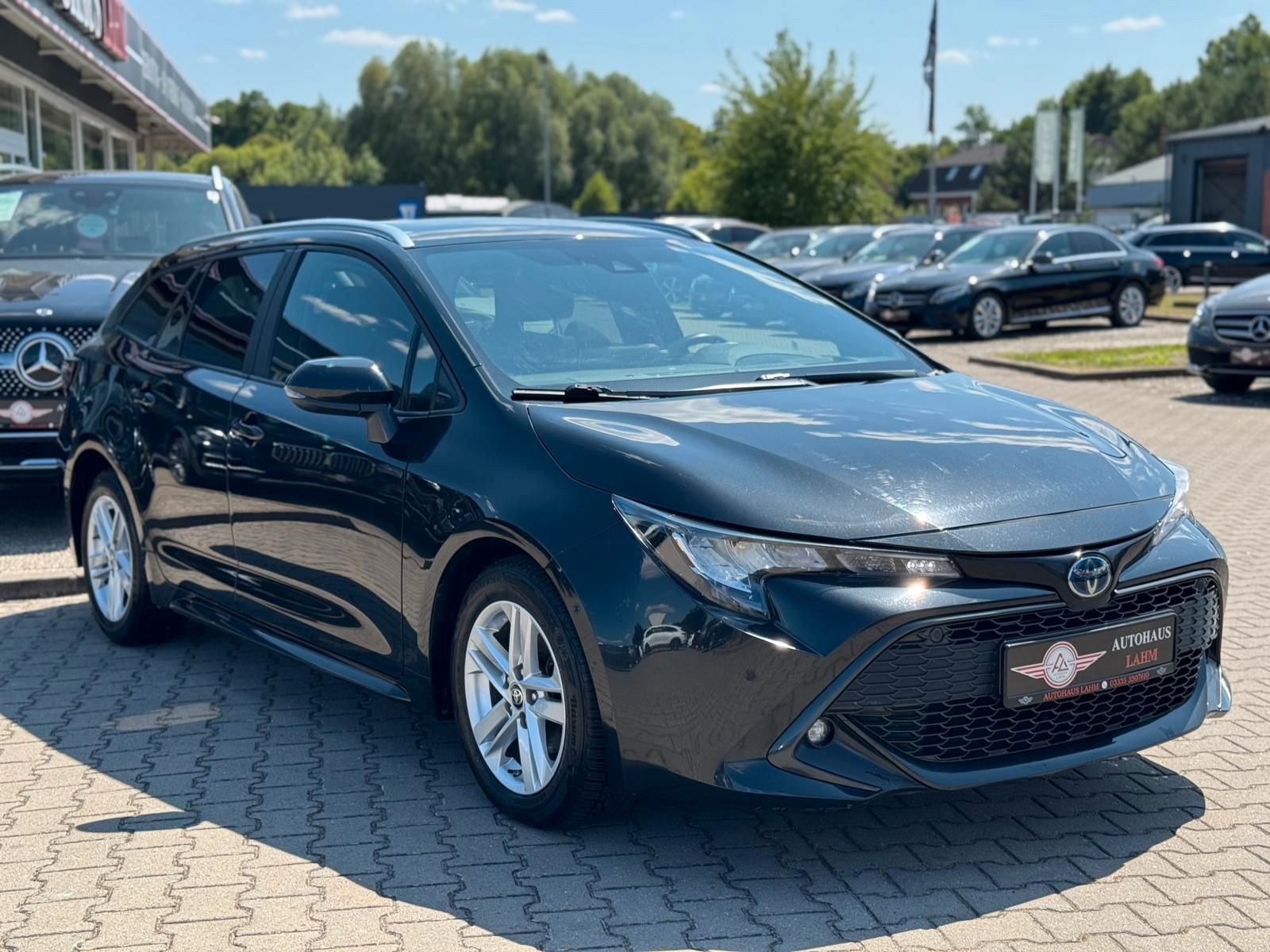 Toyota Corolla Touring Sports Hybrid Business Edition - Samsaru's Car Outlet