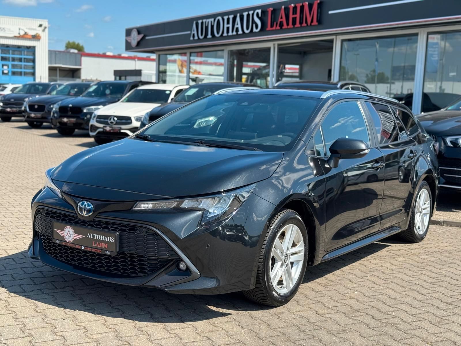 Toyota Corolla Touring Sports Hybrid Business Edition - Samsaru's Car Outlet
