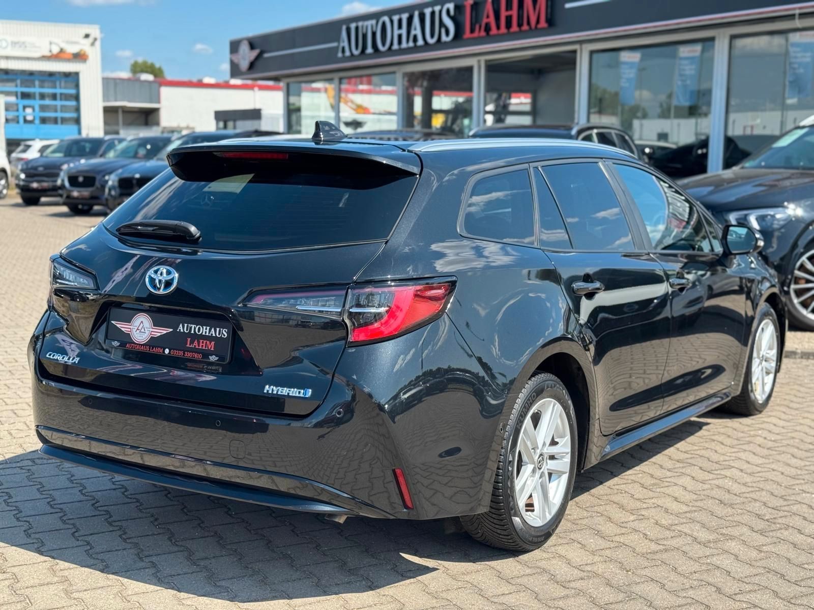 Toyota Corolla Touring Sports Hybrid Business Edition - Samsaru's Car Outlet