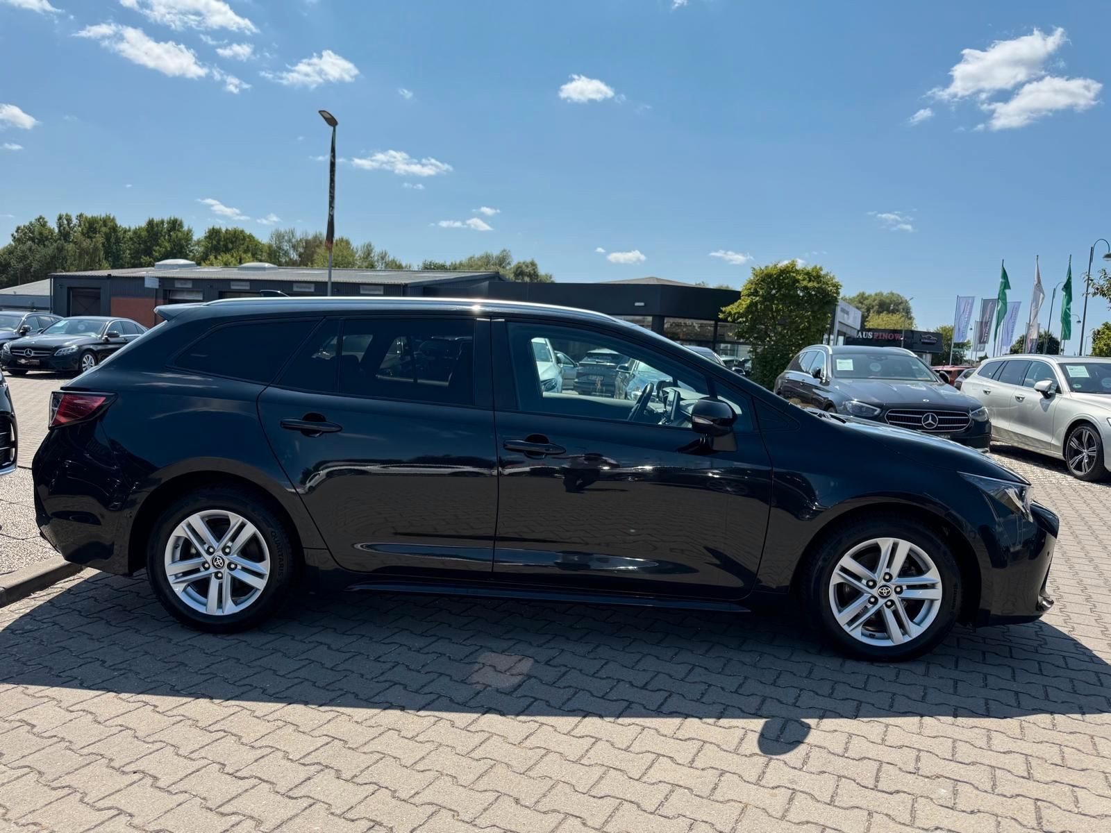 Toyota Corolla Touring Sports Hybrid Business Edition - Samsaru's Car Outlet
