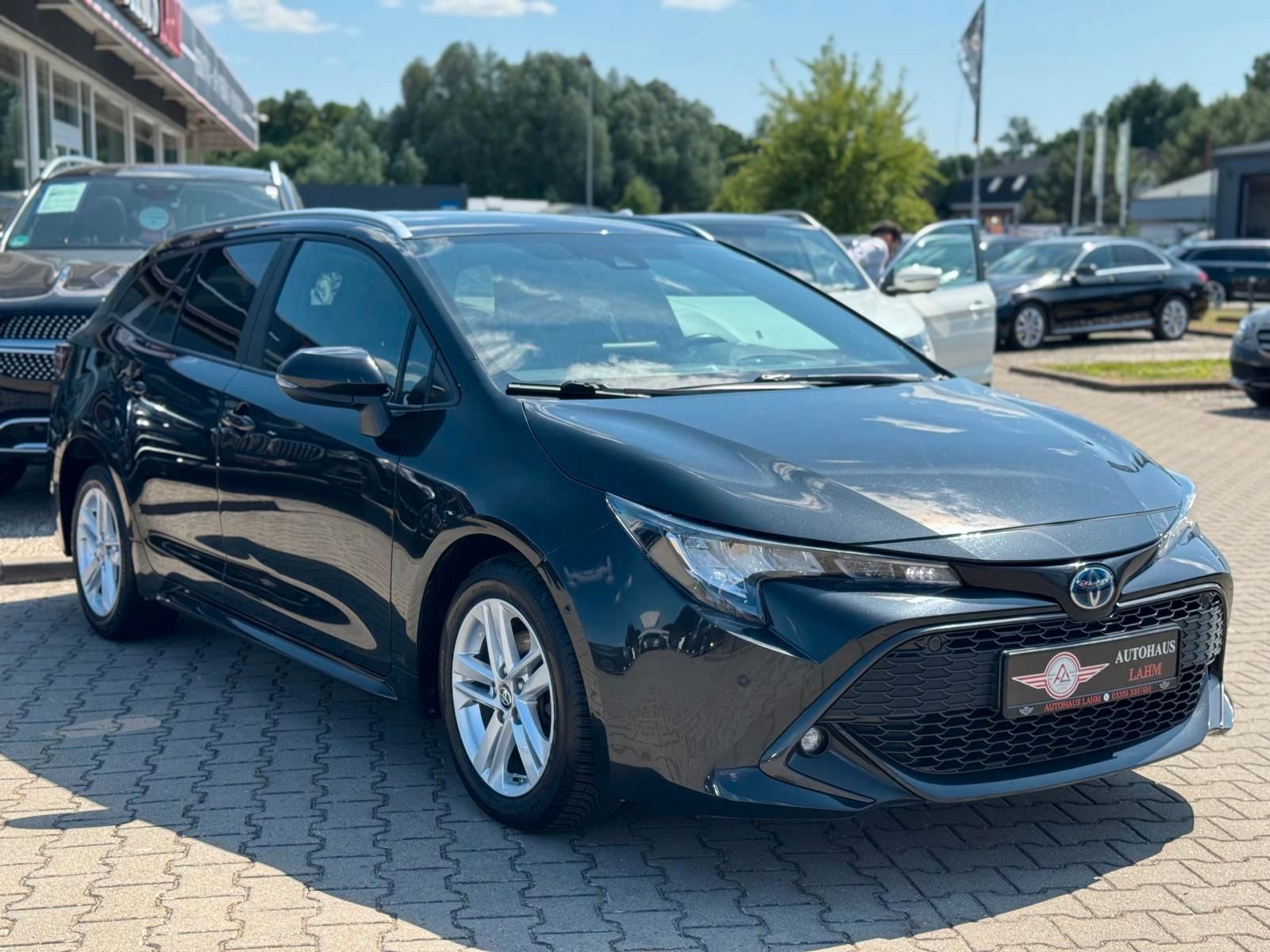 Toyota Corolla Touring Sports Hybrid Business Edition - Samsaru's Car Outlet