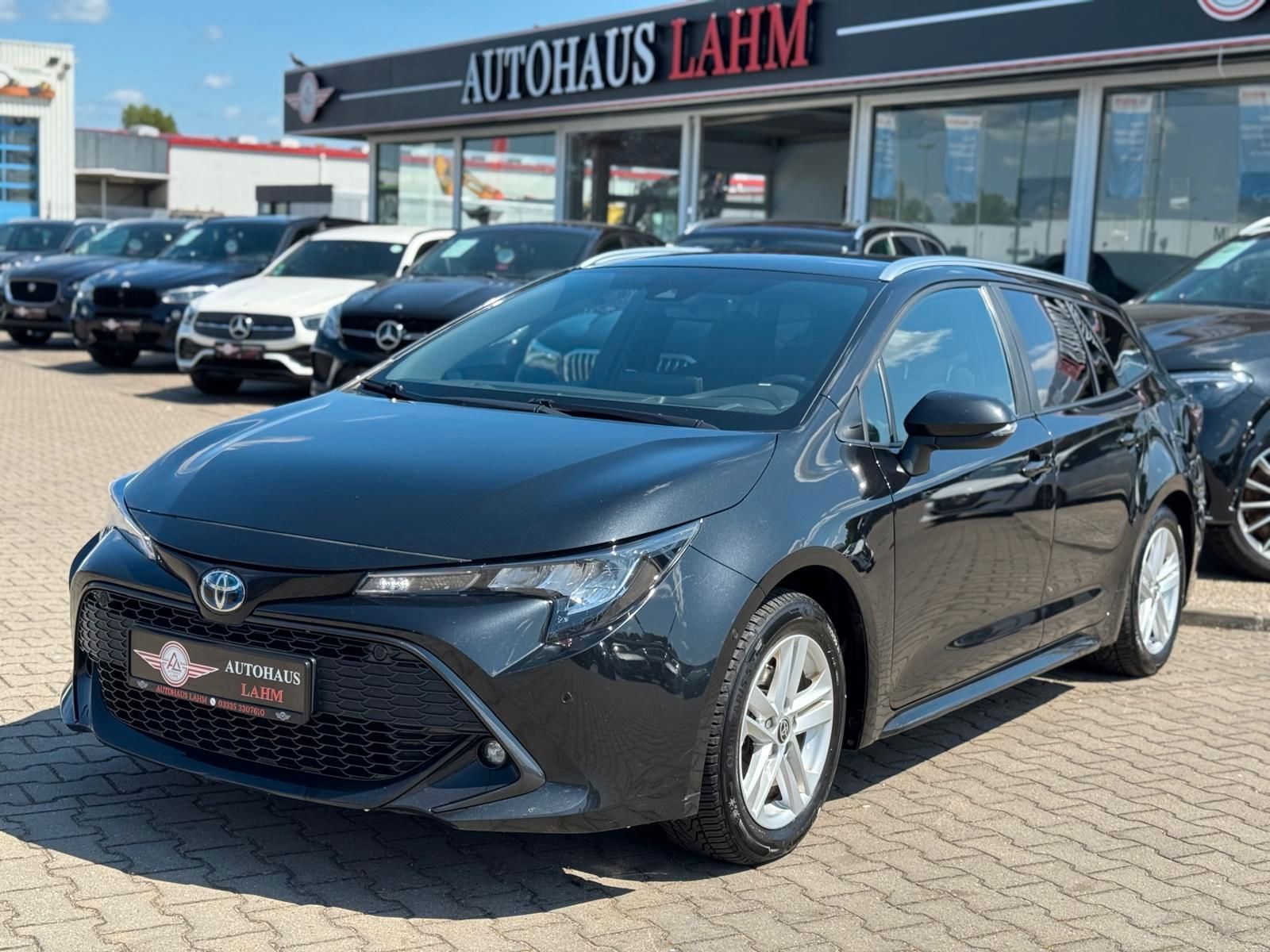 Toyota Corolla Touring Sports Hybrid Business Edition - Samsaru's Car Outlet