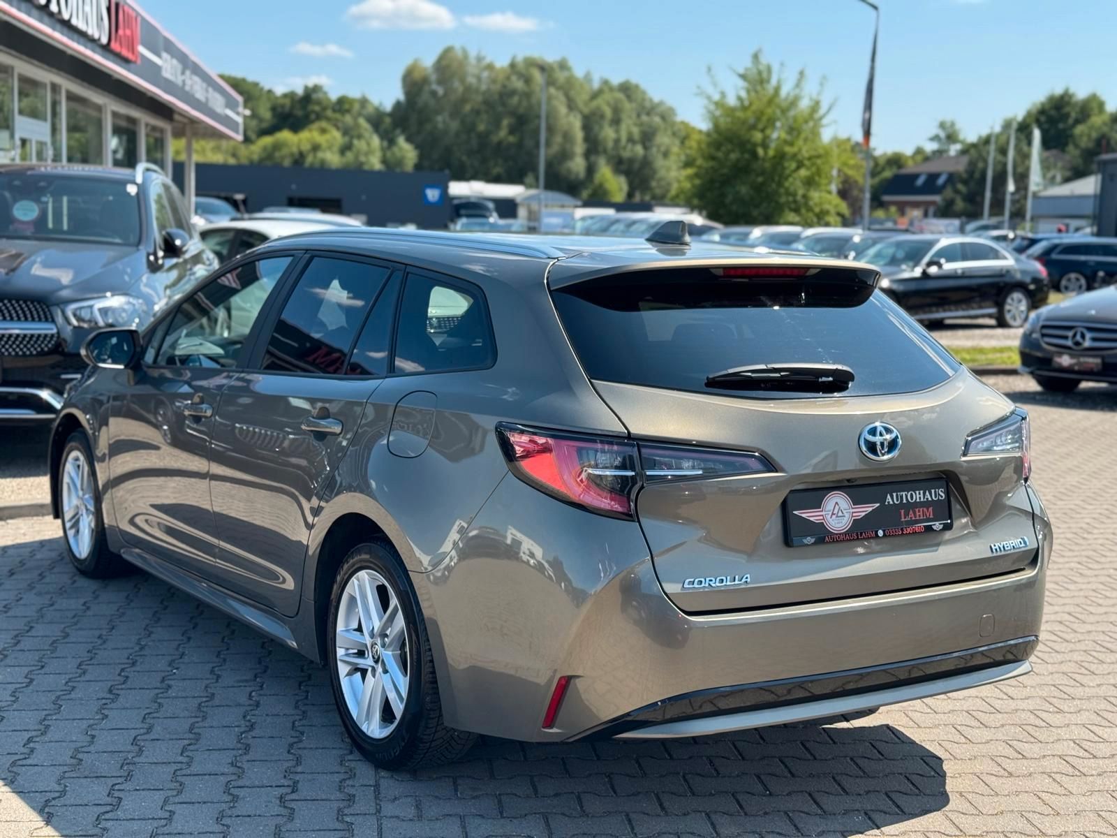 Toyota Corolla Touring Sports Hybrid Business Edition - Samsaru's Car Outlet