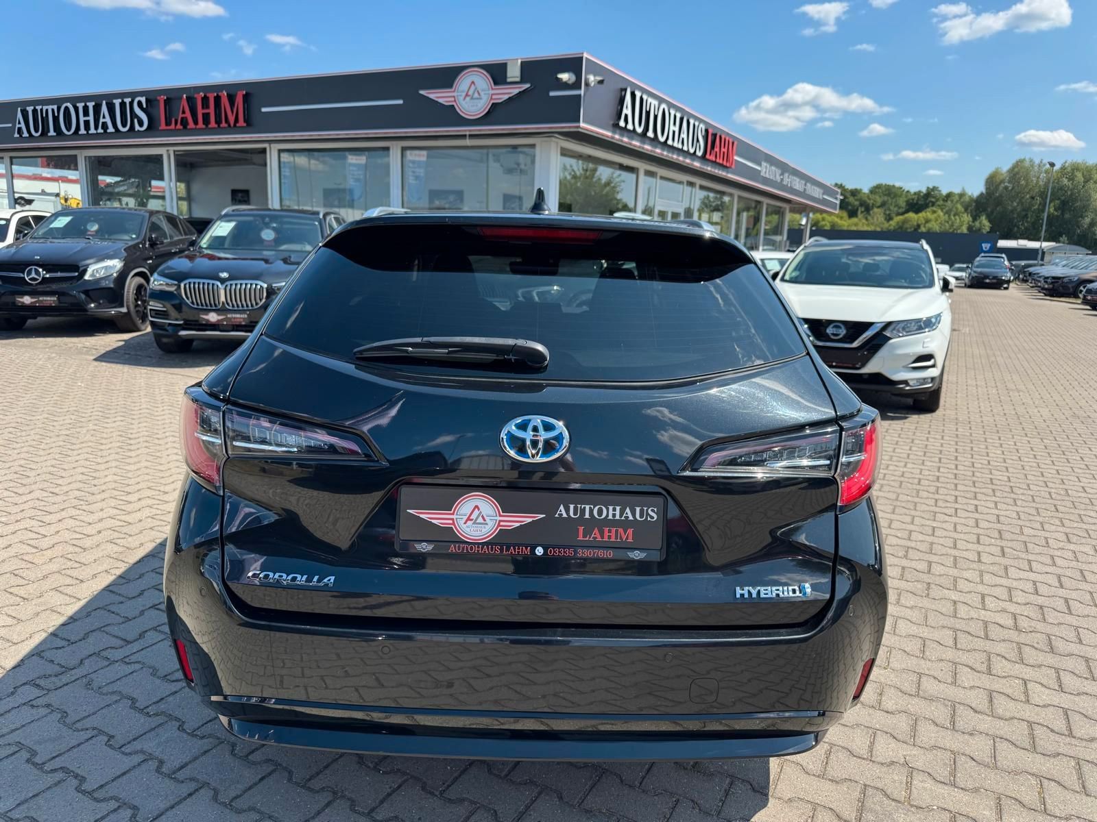 Toyota Corolla Touring Sports Hybrid Business Edition - Samsaru's Car Outlet