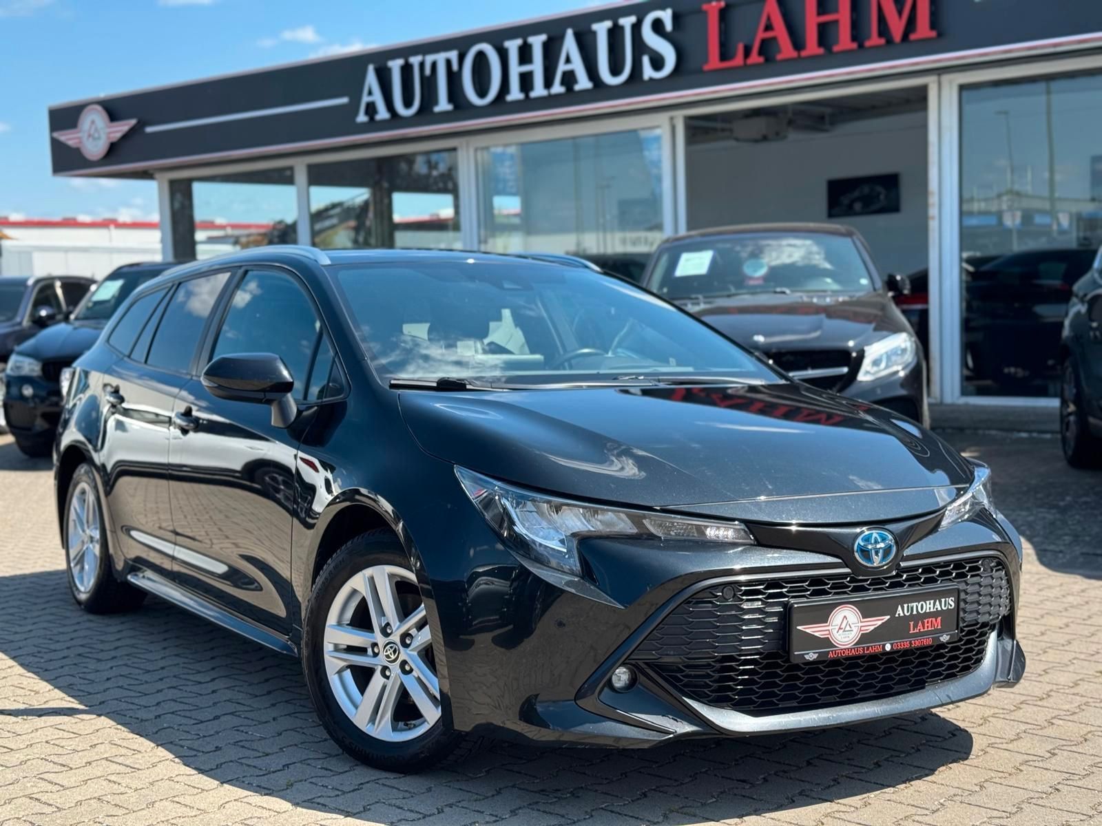 Toyota Corolla Touring Sports Hybrid Business Edition - Samsaru's Car Outlet